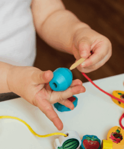 Margele din lemn si jucarii de siretuit